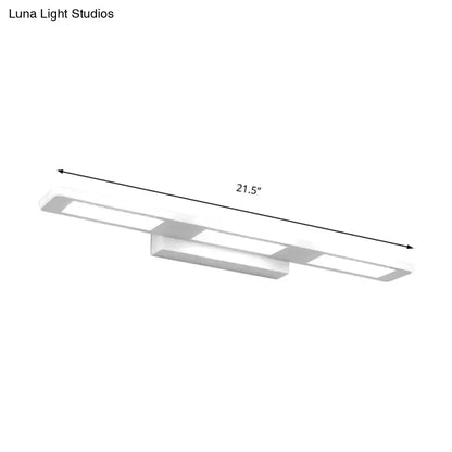 Modern white rectangular acrylic vanity wall light with three LED panels for sleek bathroom decor