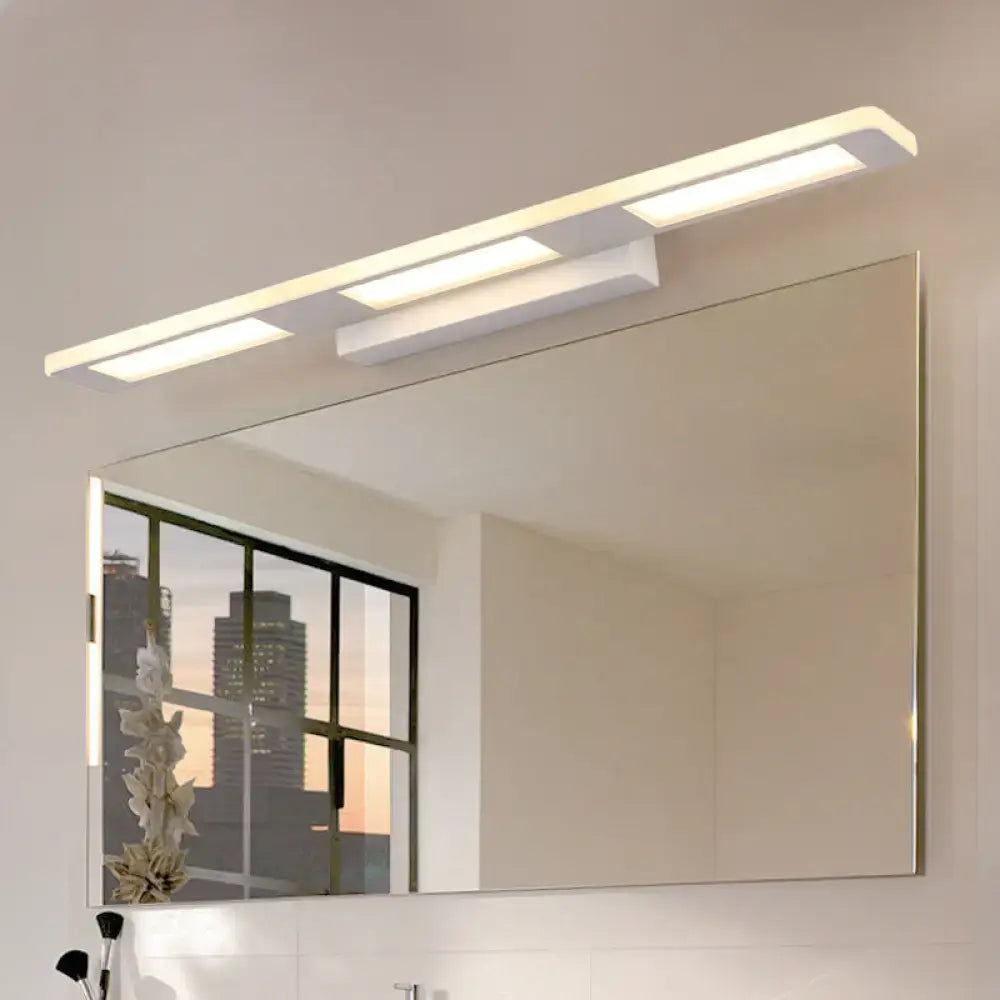 Modern white rectangular acrylic vanity wall light with sleek design and three illuminated LED panels for bathroom decor