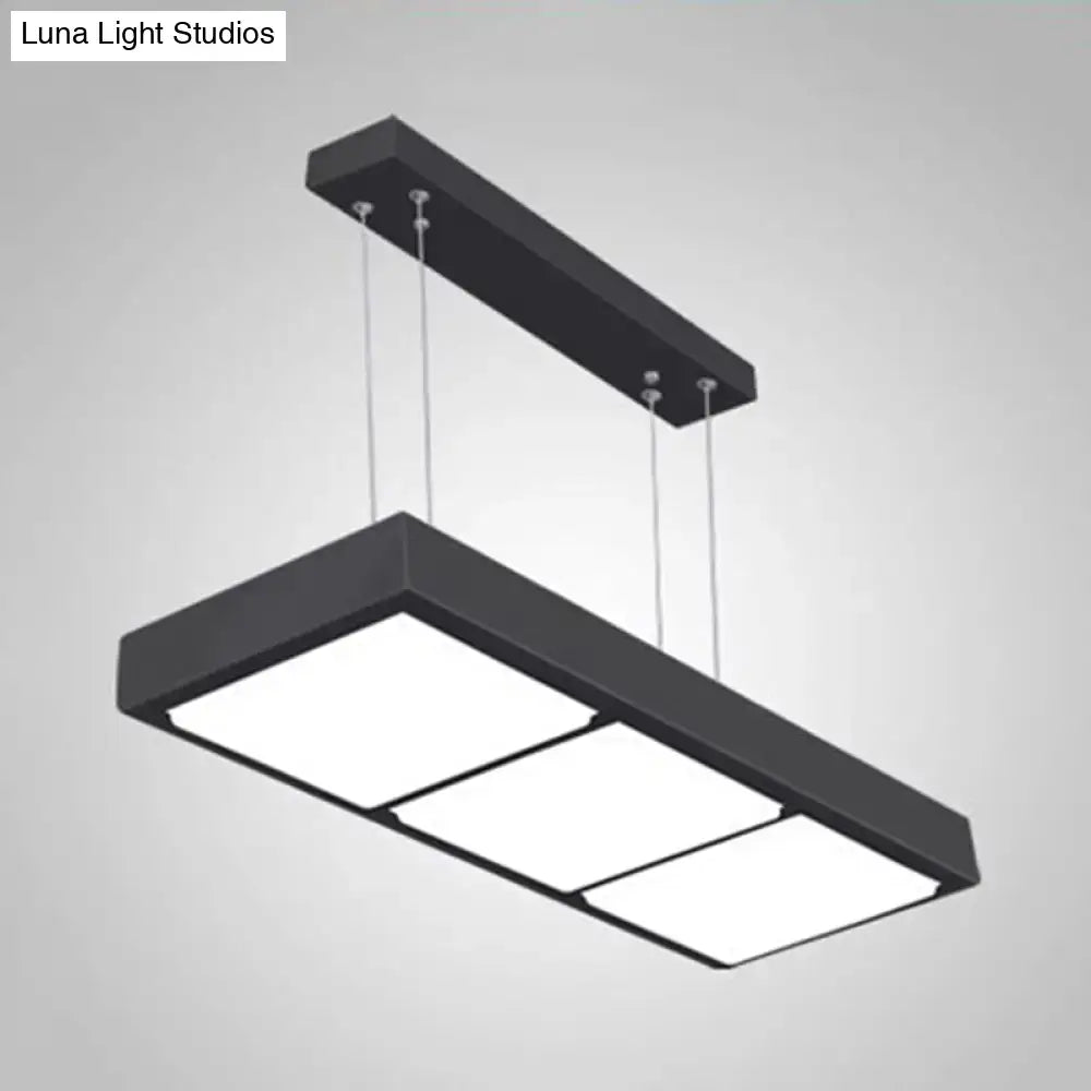 Modern black metal rectangular island lamp with three illuminated panels suspended by thin cables for office lighting