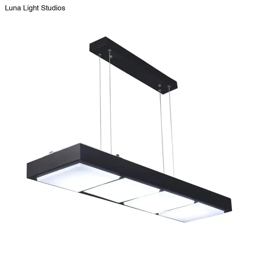 Black metal DecorBites™ rectangular island lamp with four illuminated square panels for modern office lighting