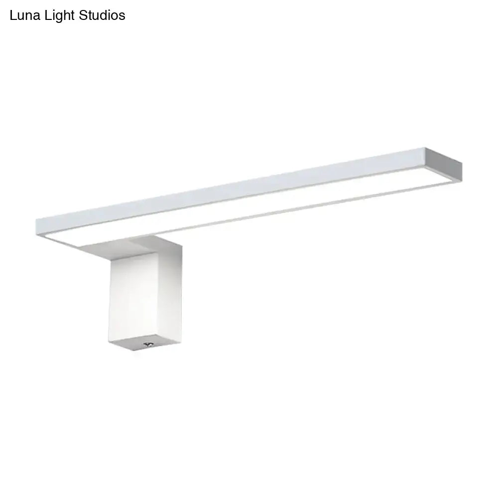 Modern white rectangular led wall lamp with sleek minimalist design emitting warm white light for bedroom use