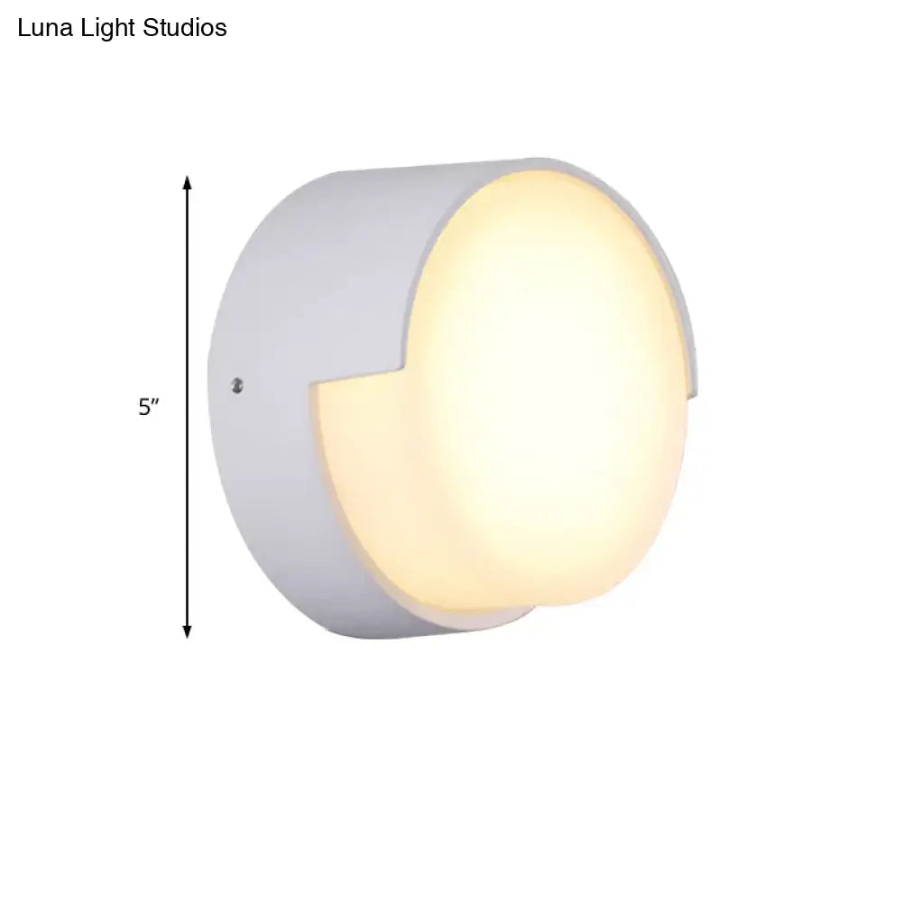 Modern white cylindrical direct wired wall light with warm white diffused glow for indoor hallway lighting