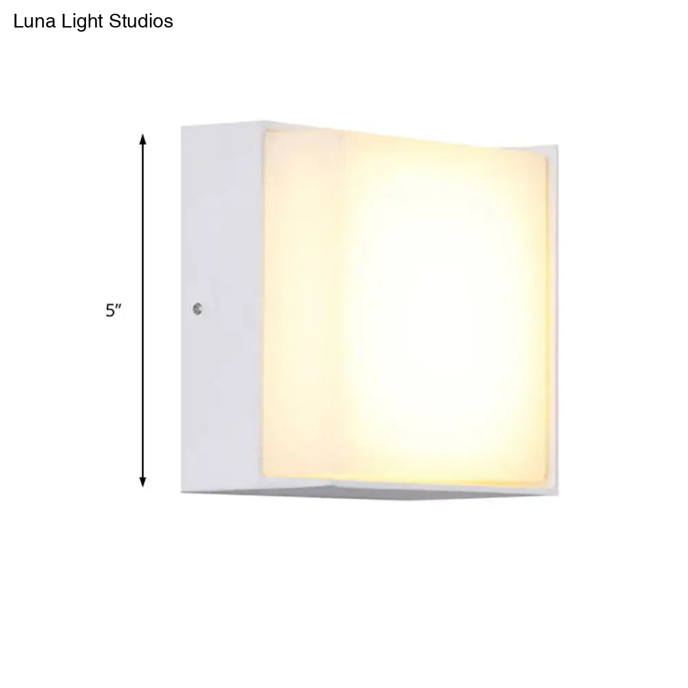 Modern white rectangular wall light with warm white LED glow direct wired for hallway lighting