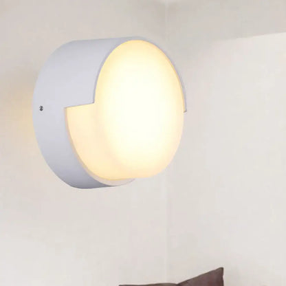 Modern white rectangular wall light with circular diffuser warm white direct wired for hallway use