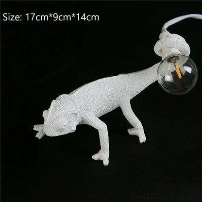 Modern white resin chameleon led table lamp with textured design and clear bulb tail for bedroom reading decorbites chameleon led