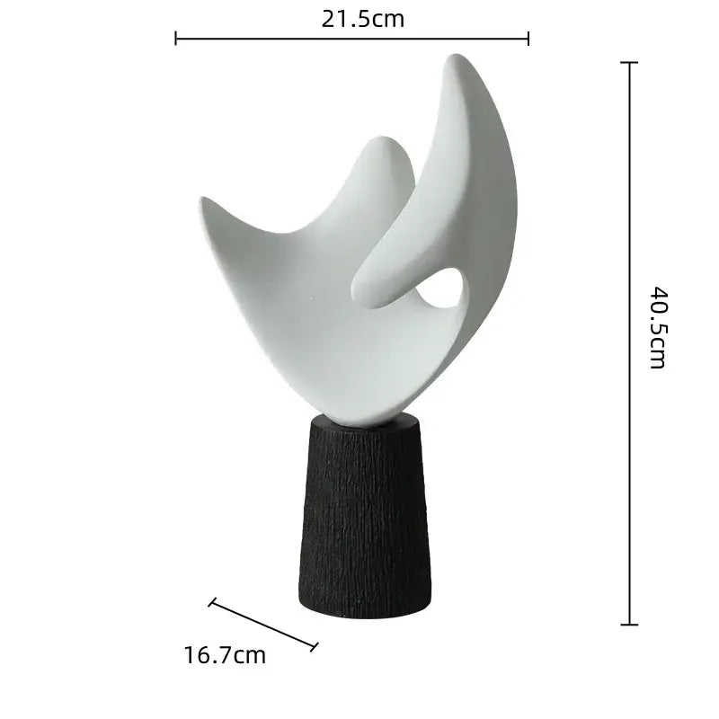 Modern white resin sculpture with flowing organic curves on dark wood pedestal for living room decorbites abstract decor