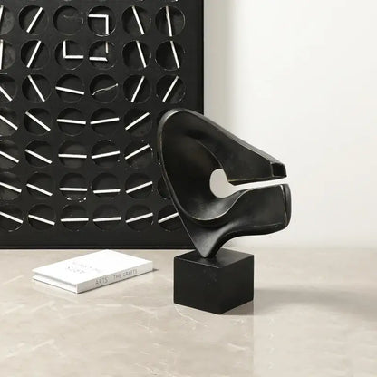Modern white resin sculpture decorbites abstract hollowed-out black abstract resin sculpture on wood pedestal base decorbites abstract