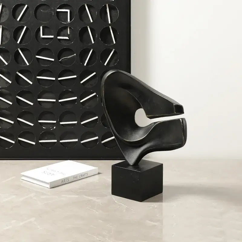 Modern white resin sculpture decorbites abstract hollowed-out black abstract resin sculpture on wood pedestal base decorbites abstract