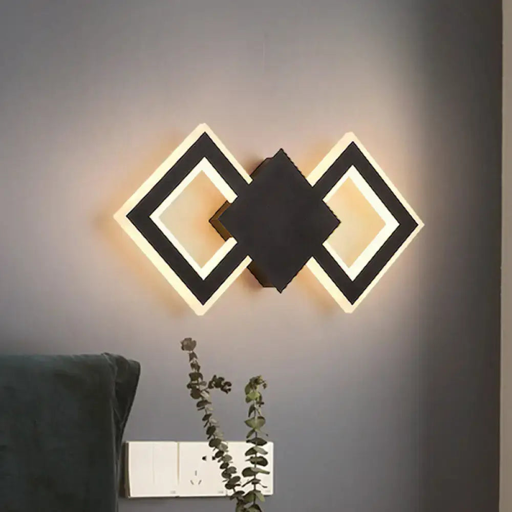 Modern black and white geometric led wall sconce with illuminated diamond frames and white warm light type for bedroom use