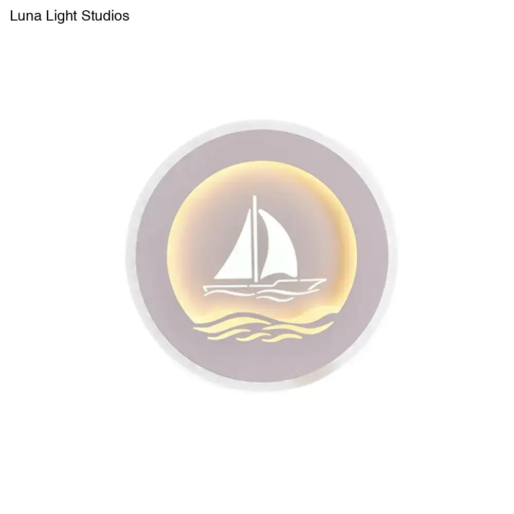 Modern wall light with sailboat tree pattern featuring a lavender ring and warm golden glow for bedroom use