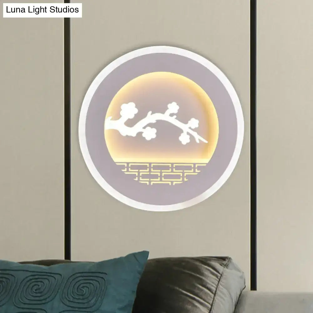 Modern white sailboat tree pattern wall light with warm yellow glow and elegant white blossoming branches in lavender frame