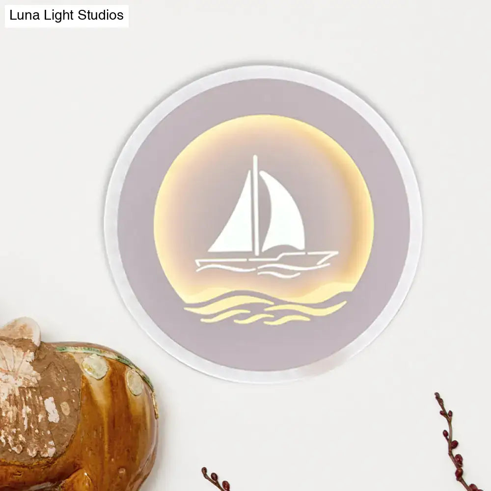 Modern wall light with a soft lavender frame and warm yellow glow featuring a white illuminated sailboat tree pattern