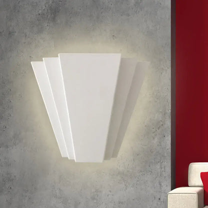 Modern white sector flush mount led wall sconce with sleek layered geometric design for living room lighting
