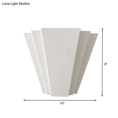 Modern white sector flush mount led wall sconce with fan-like design and sleek clean lines for living room lighting
