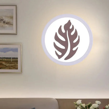 Modern white sector leaf pattern wall light with dark brown monstera leaf design for living room sconce