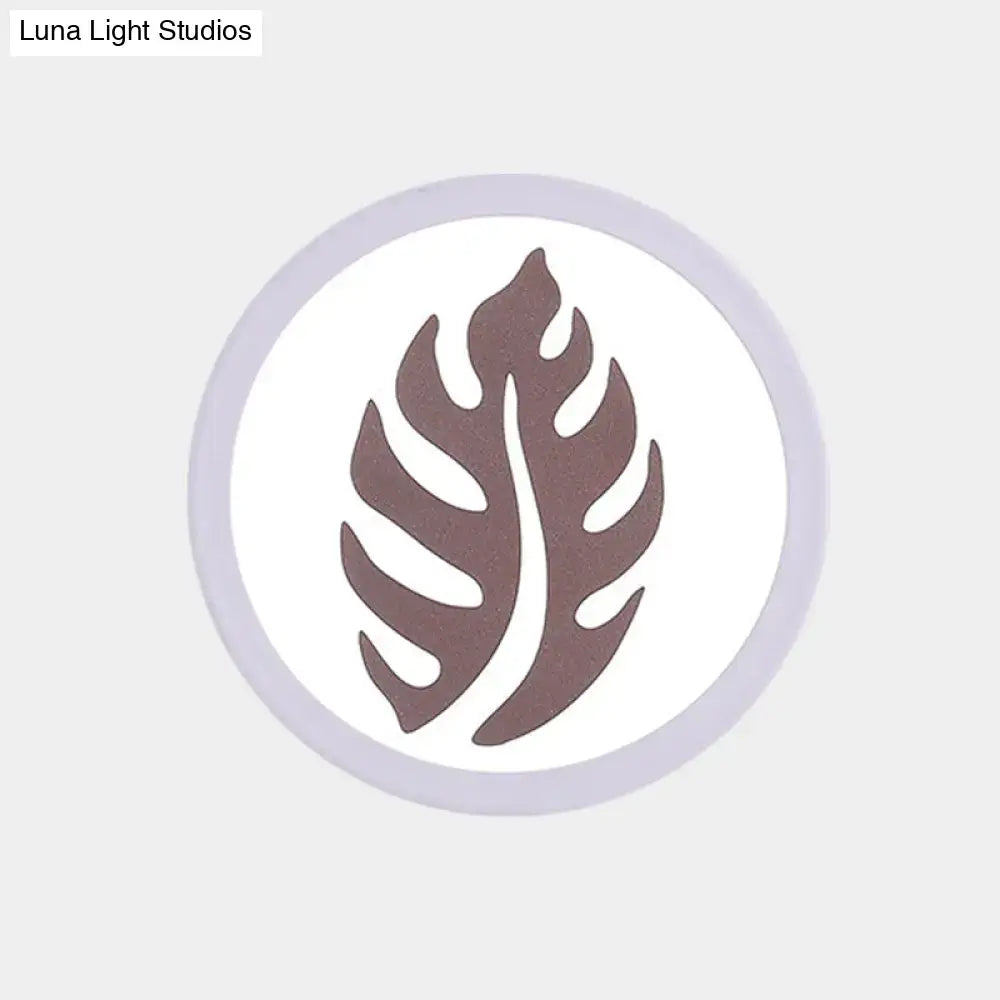 Modern white sector leaf pattern wall light with a circular brown leaf design on a white background and gray border