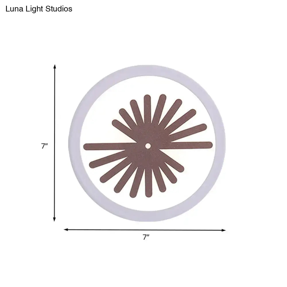 Modern white sector leaf pattern wall light with a circular white clock face and brown radial spokes for living room sconce