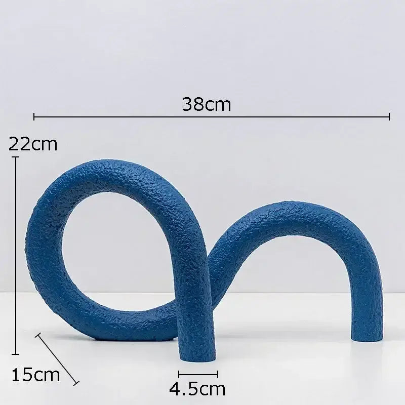 Blue textured resin abstract twisted knot sculpture with modern flowing design for living room decor