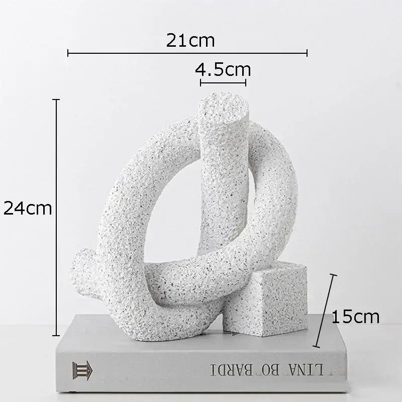 Modern white speckled abstract twisted knot resin sculpture with interlocking loops on square base for living room decor
