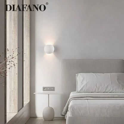 Modern white spherical gypsum led wall lamp with matte finish featuring diafano logo for bedroom sconce lighting