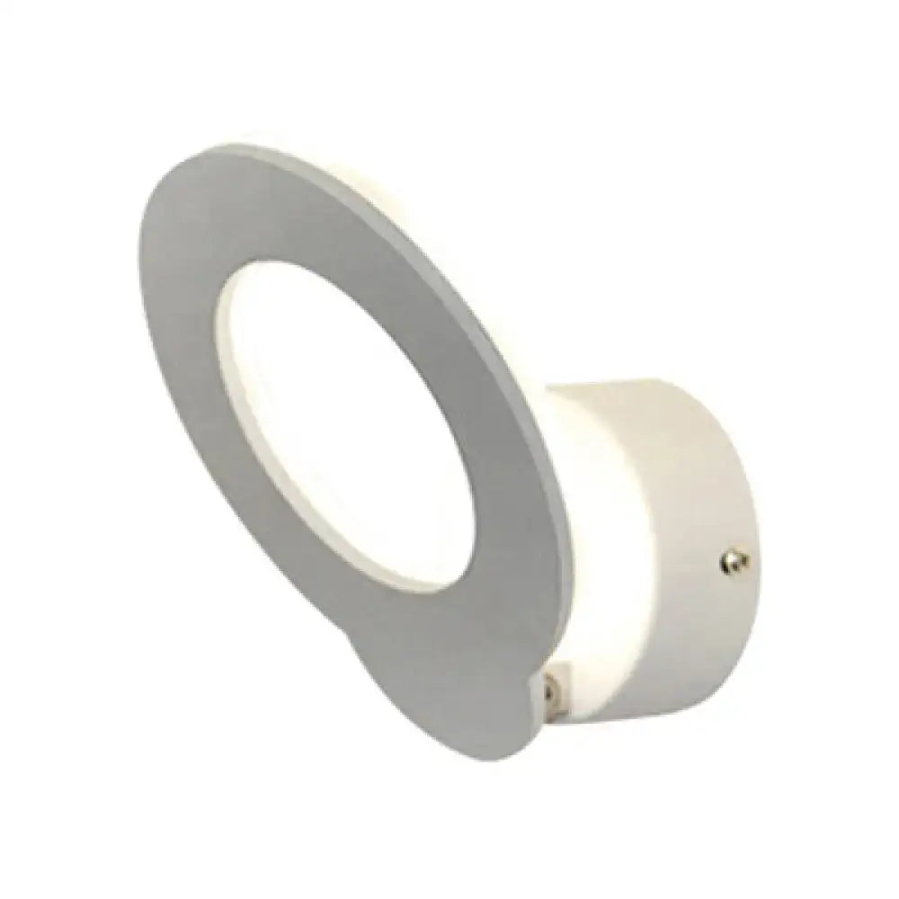 Modern gray circular wall sconce with sleek minimalist design and warm natural color temperature illumination