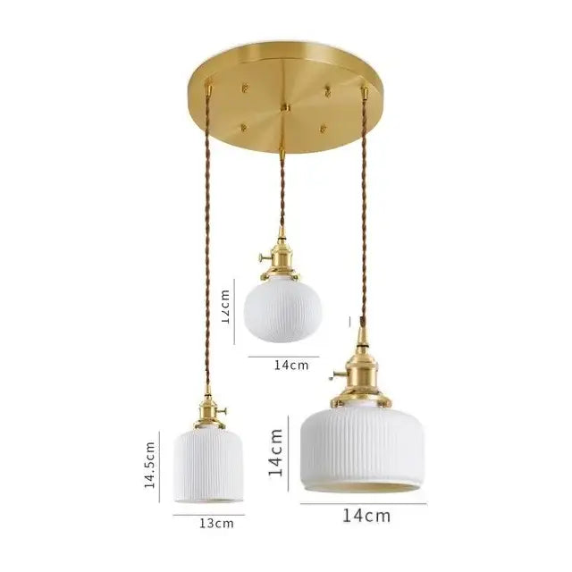 Set of three modern white textured glass ceramic led pendant lights with gold-toned fixtures for kitchen decorbites ceramic led