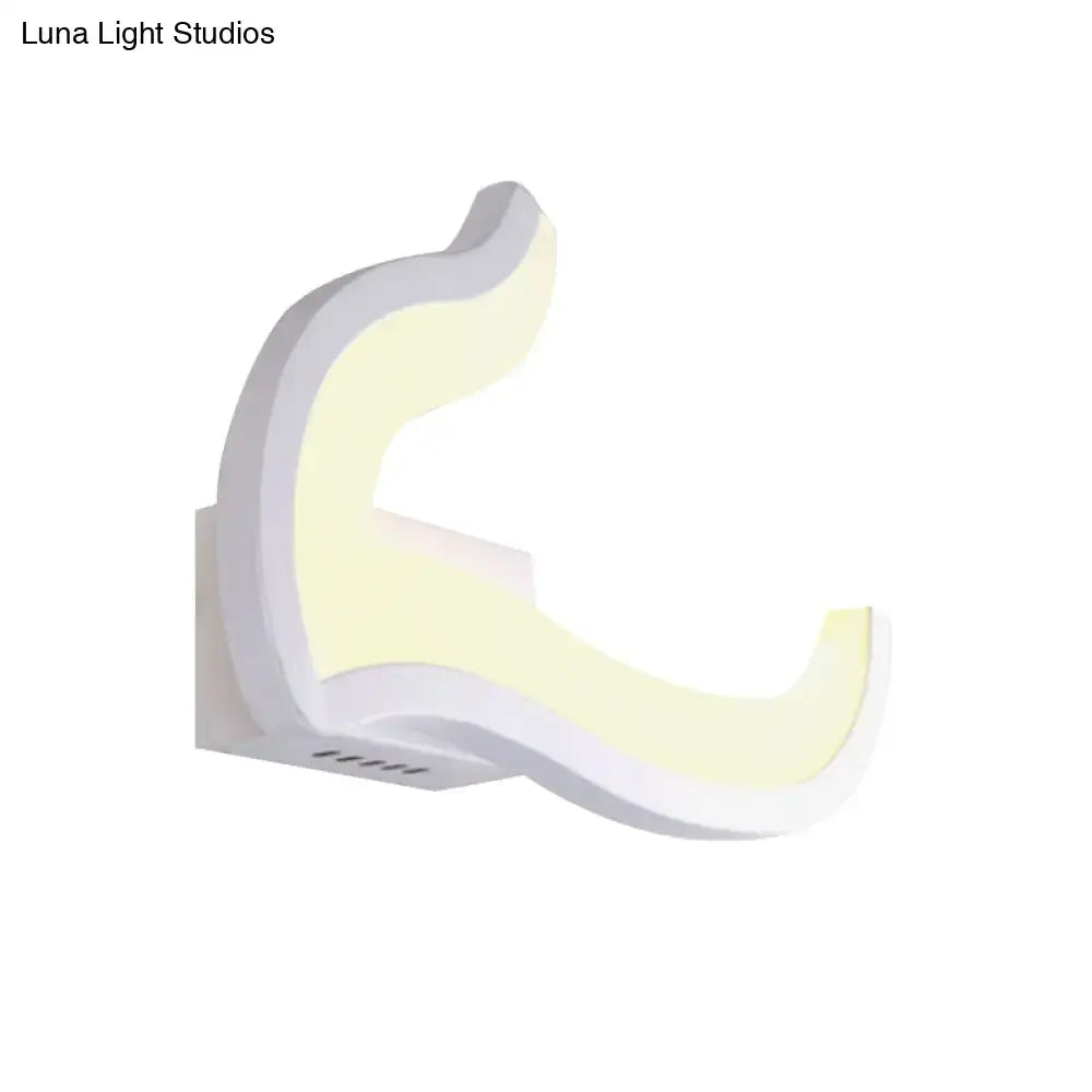 Modern white u-shaped led wall sconce with sleek curved design and soft yellow illumination for bedroom lighting