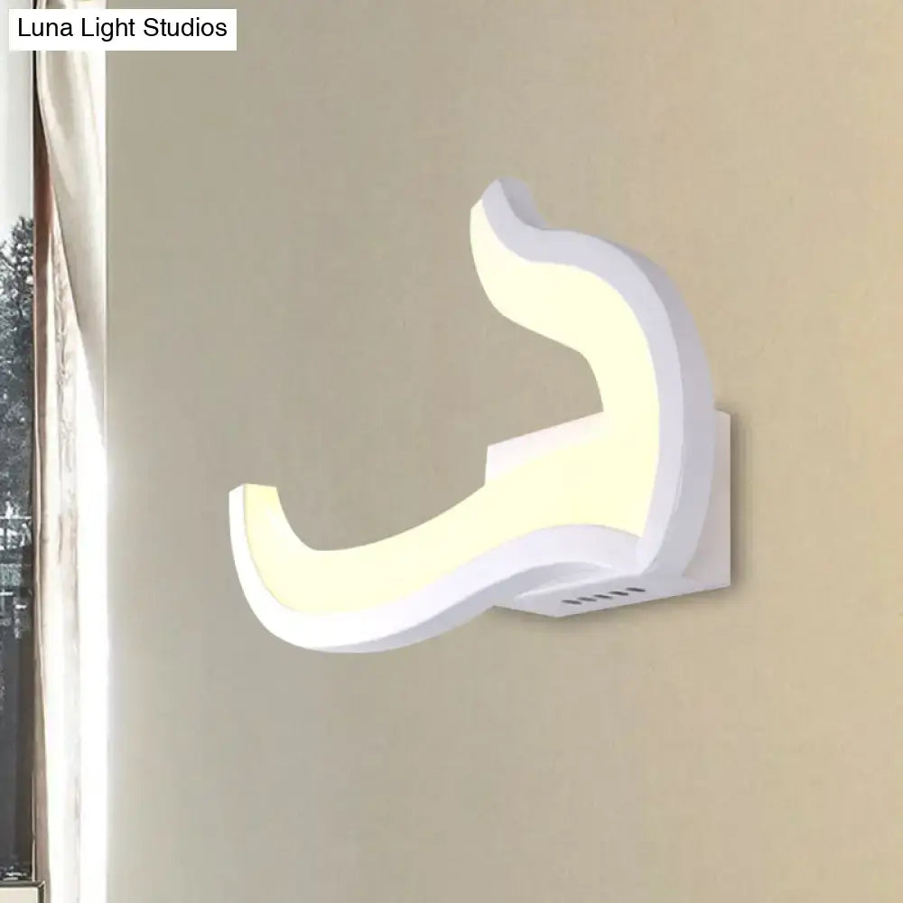 Modern white u-shaped led wall sconce with a sleek curved design emitting warm and white bedroom light