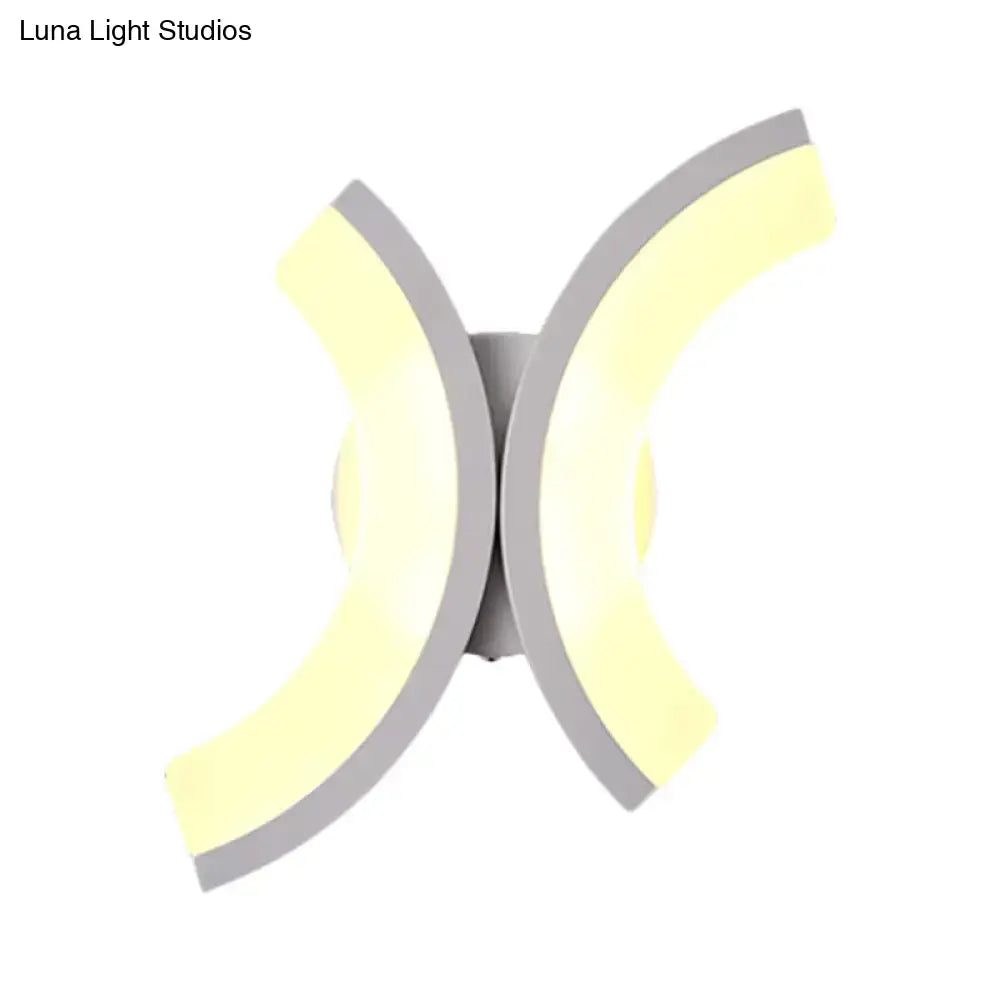 Modern white u-shaped led wall sconce with gray and yellow butterfly design providing warm and white bedroom light