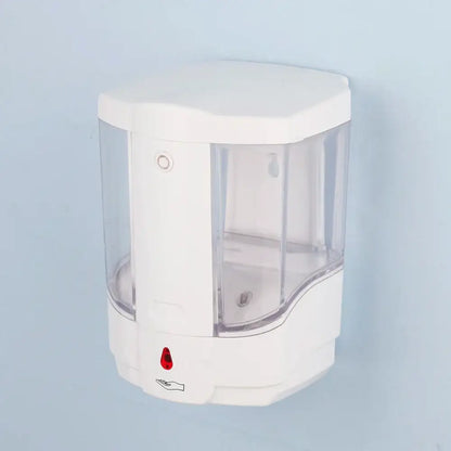 Modern white wall mounted automatic liquid soap dispenser with clear plastic sides and red sensor button for kitchen use