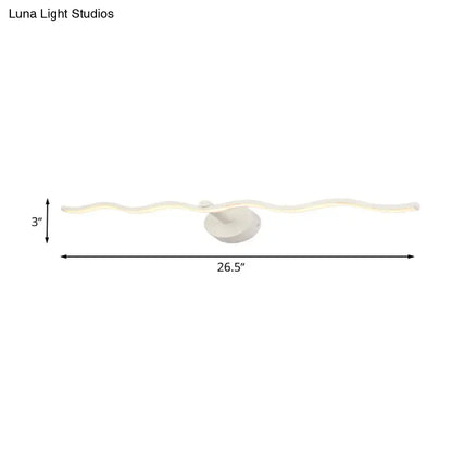 A modern white wave design led vanity light fixture with a wavy acrylic body and circular base for bathrooms