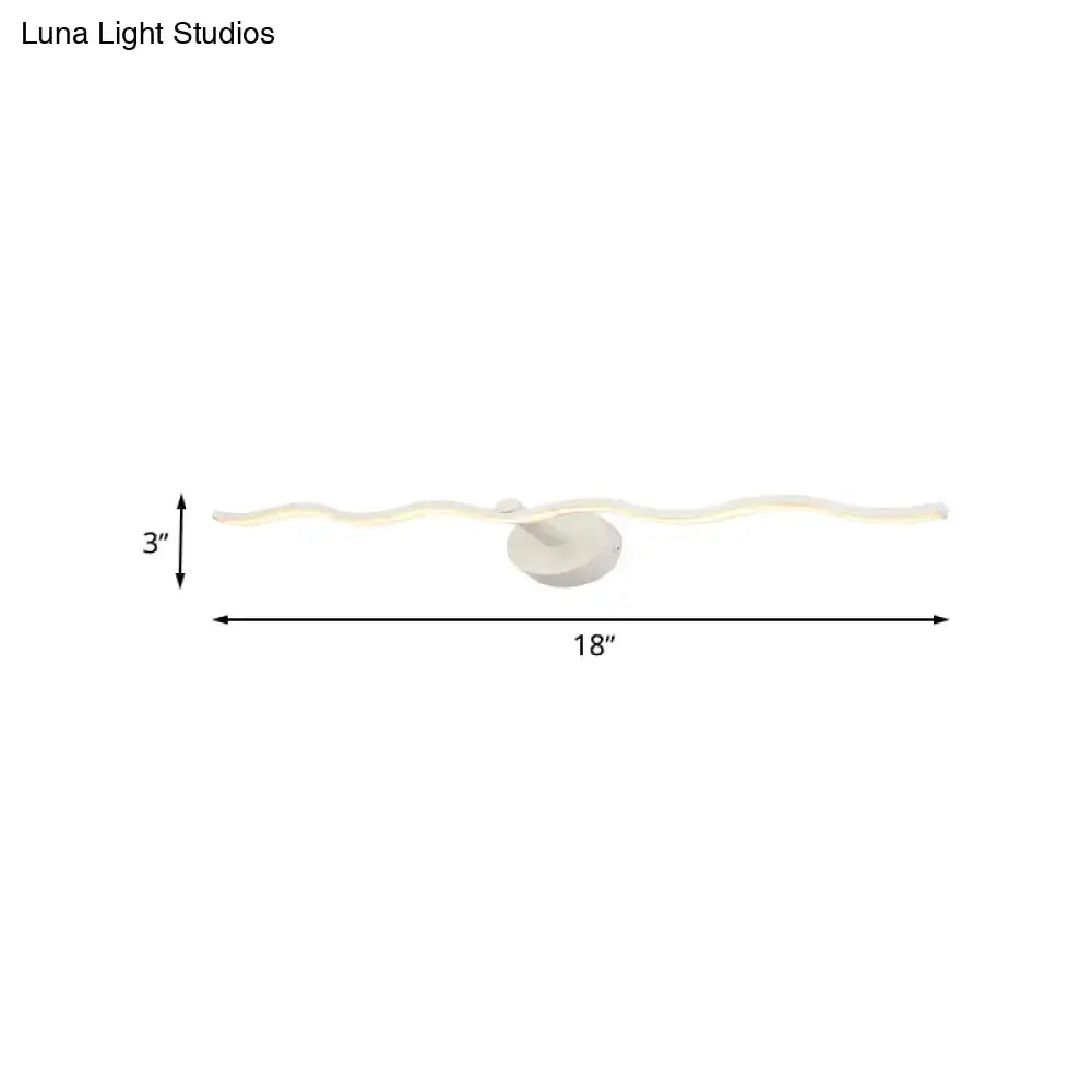 Modern white wave design led vanity light fixture with wavy illuminated pattern and circular base for bathroom use