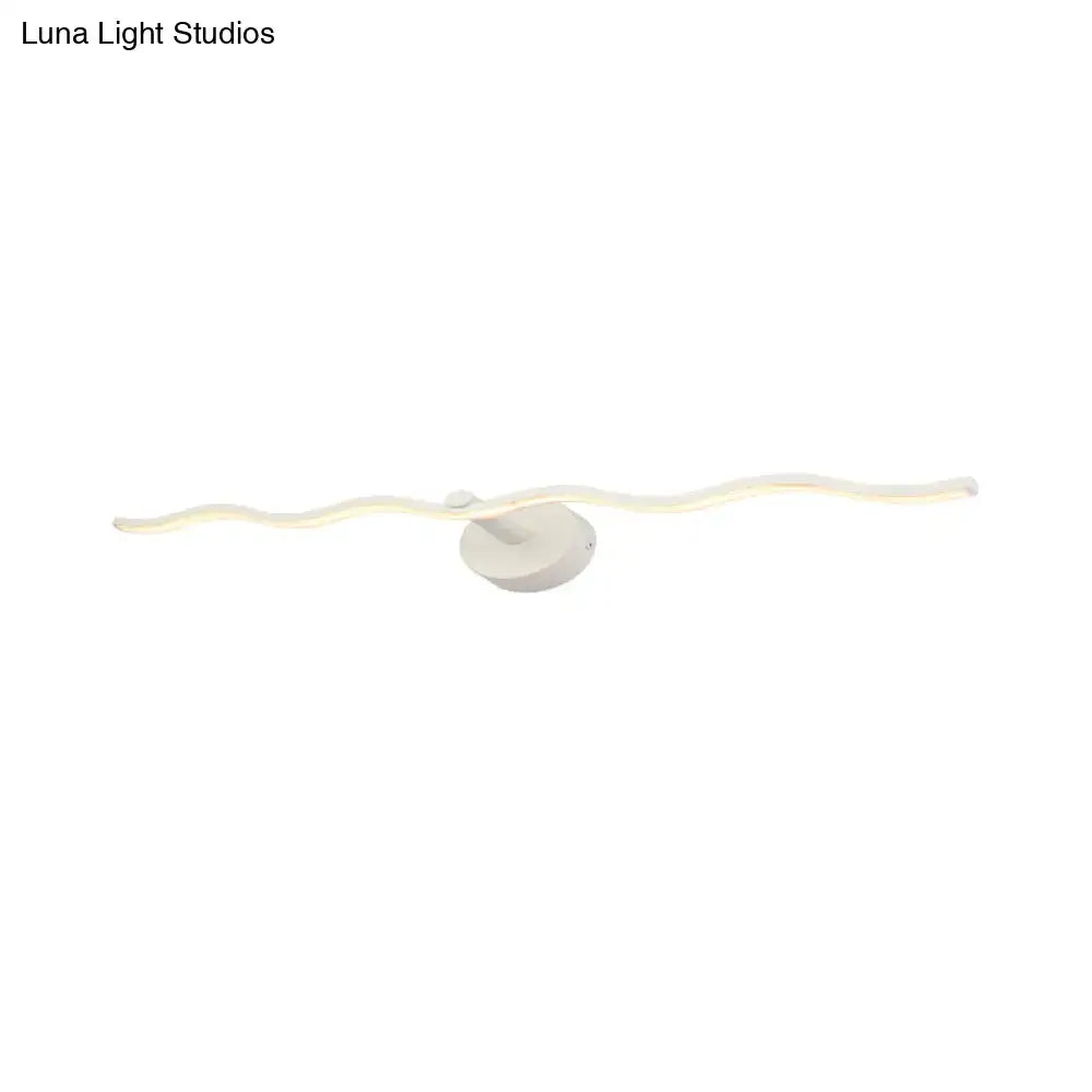 Modern white wave vanity light led wall sconce with a sleek wavy design and circular base for bathroom use