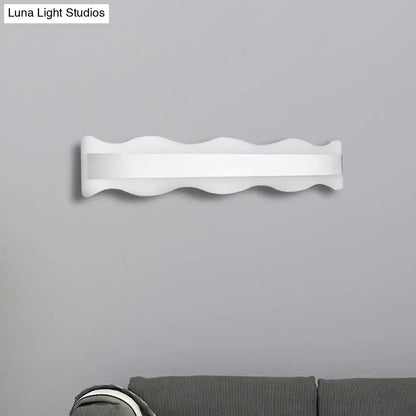 Modern white wave led light fixture with a sleek wavy design for bathroom white warm wall-mounted sconce