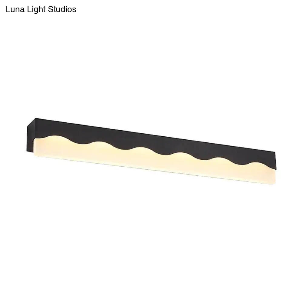 Modern black wave-patterned led vanity light fixture with sleek minimalist design for bathroom wall use