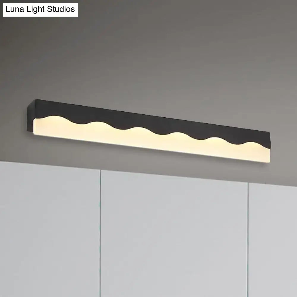 Modern black wave patterned led vanity light fixture with sleek minimalist design for bathroom use