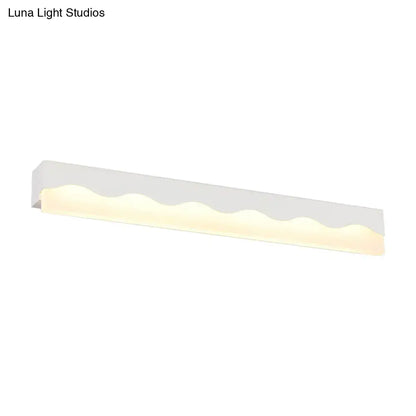 Modern white wave led vanity light fixture with sleek wavy design and warm glow as an elegant led vanity light