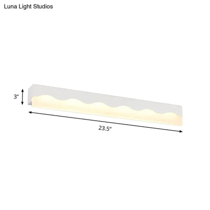 Modern white wave led vanity light fixture with sleek wavy design and warm ambient lighting for bathroom use