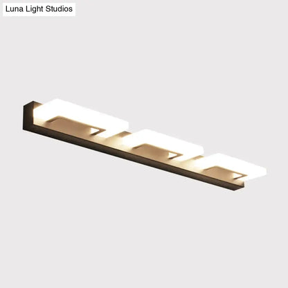 Modern wood acrylic rectangle vanity sconce wall lighting with sleek black frame and frosted glass panels emitting warm light
