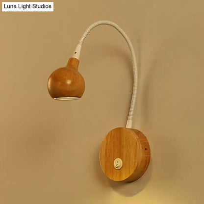 Wooden wall light with adjustable arm, flexible gooseneck, round base in white and beige for bedroom reading