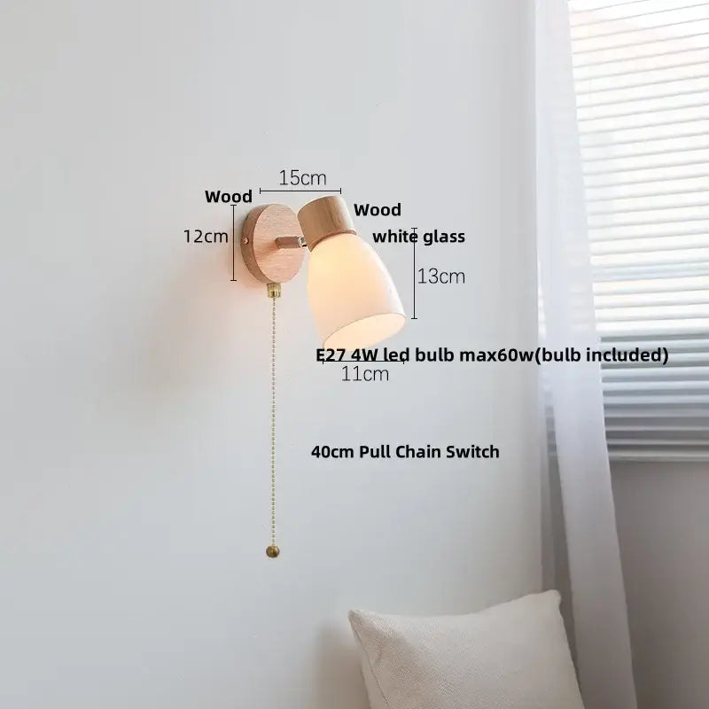 Minimalist wall sconce with light wood finish and white decorbites amber glass shade featuring e27 led bulb