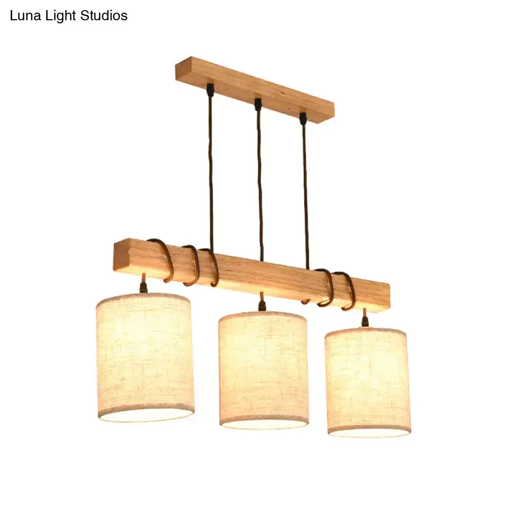Modern wood and beige fabric island lighting fixture with three cylindrical linen shades for dining room 220v-240v 110v-120v