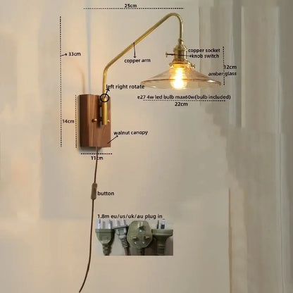 Brass-finished copper led wall sconce with walnut canopy and amber glass shade for modern bedroom or stair lighting