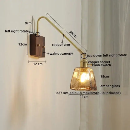 A warm amber glass copper led wall sconce with walnut canopy and adjustable socket knob switch for bedroom or stair lighting