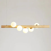 DecorBites™ minimalistic milk glass suspension light with natural wood bar and five frosted globe bulbs for dining room
