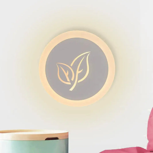 Modern wood and gray leaf wall lamp circular sconce with warm glow wooden frame and gold leaf design for bedroom use