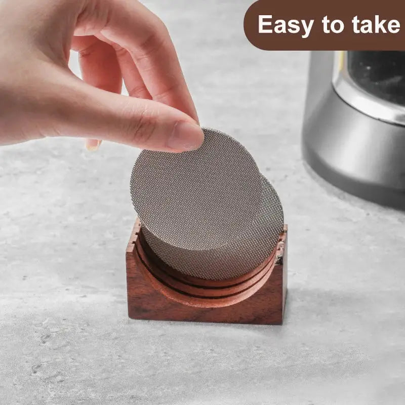 Silver mesh coffee filters in a modern wood and silver coffee filter stand for decorbites coffee kitchen storage rack