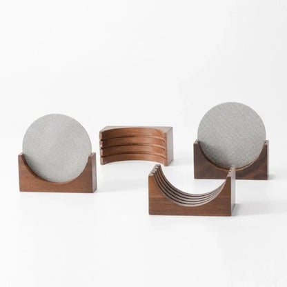 Set of four gray textured coasters in dark wood holders for decorbites coffee filter stand kitchen storage rack