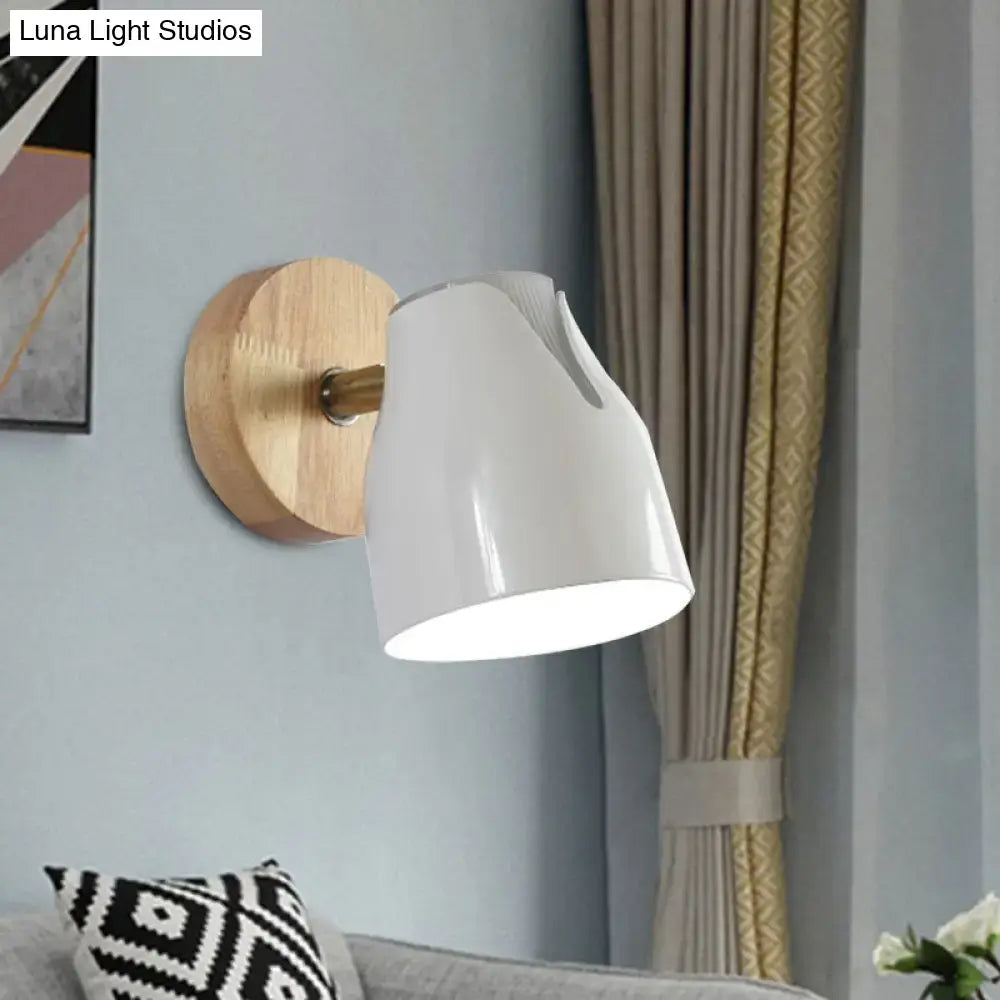 Modern white ceramic wall light with natural wood circular backplate and metallic bud shade light source
