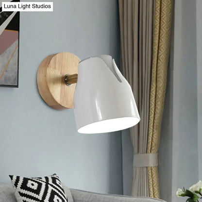 Modern white ceramic wall light with natural wood circular backplate and metallic bud shade light source